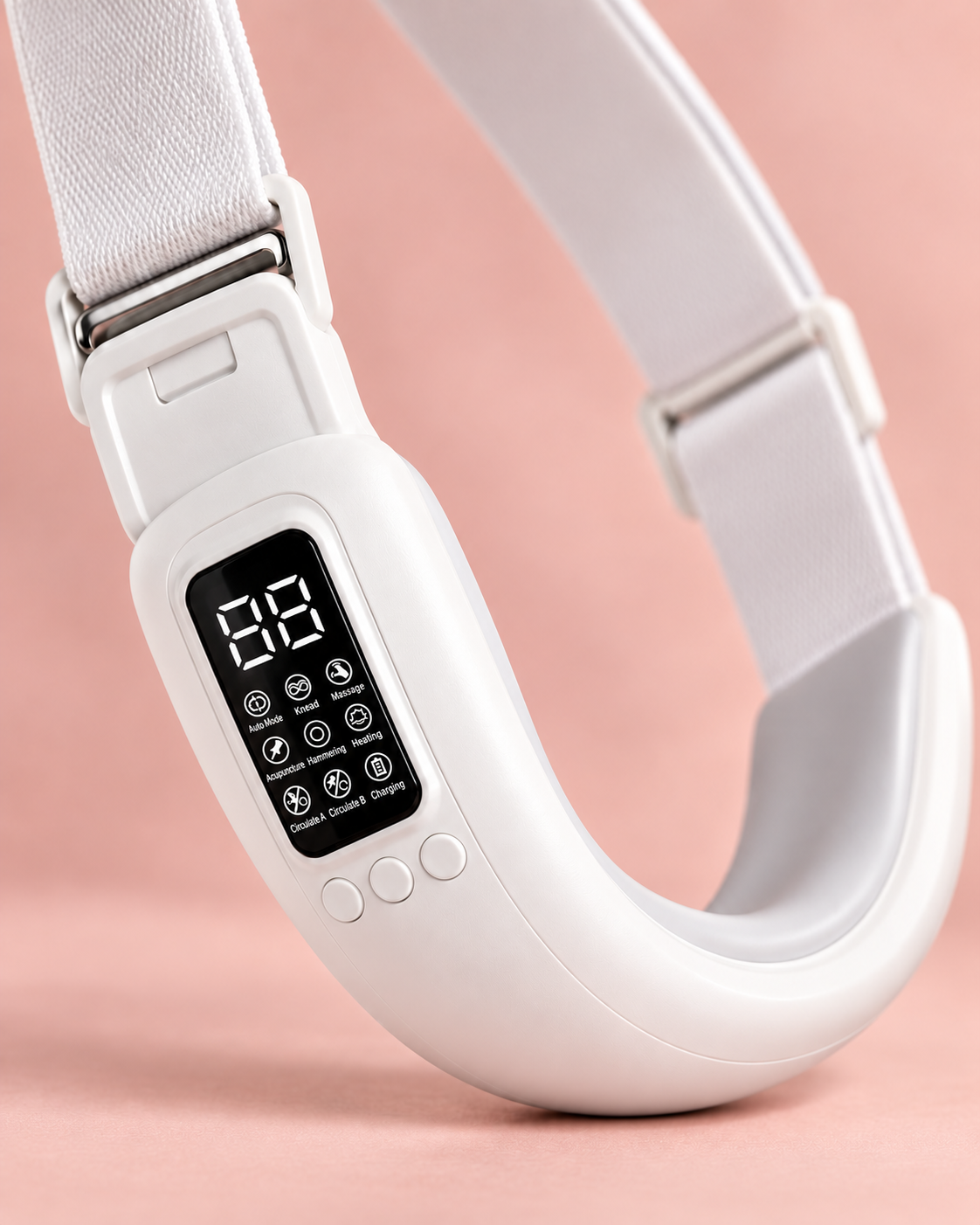 Close-up of the white facial device controls and adjustable strap